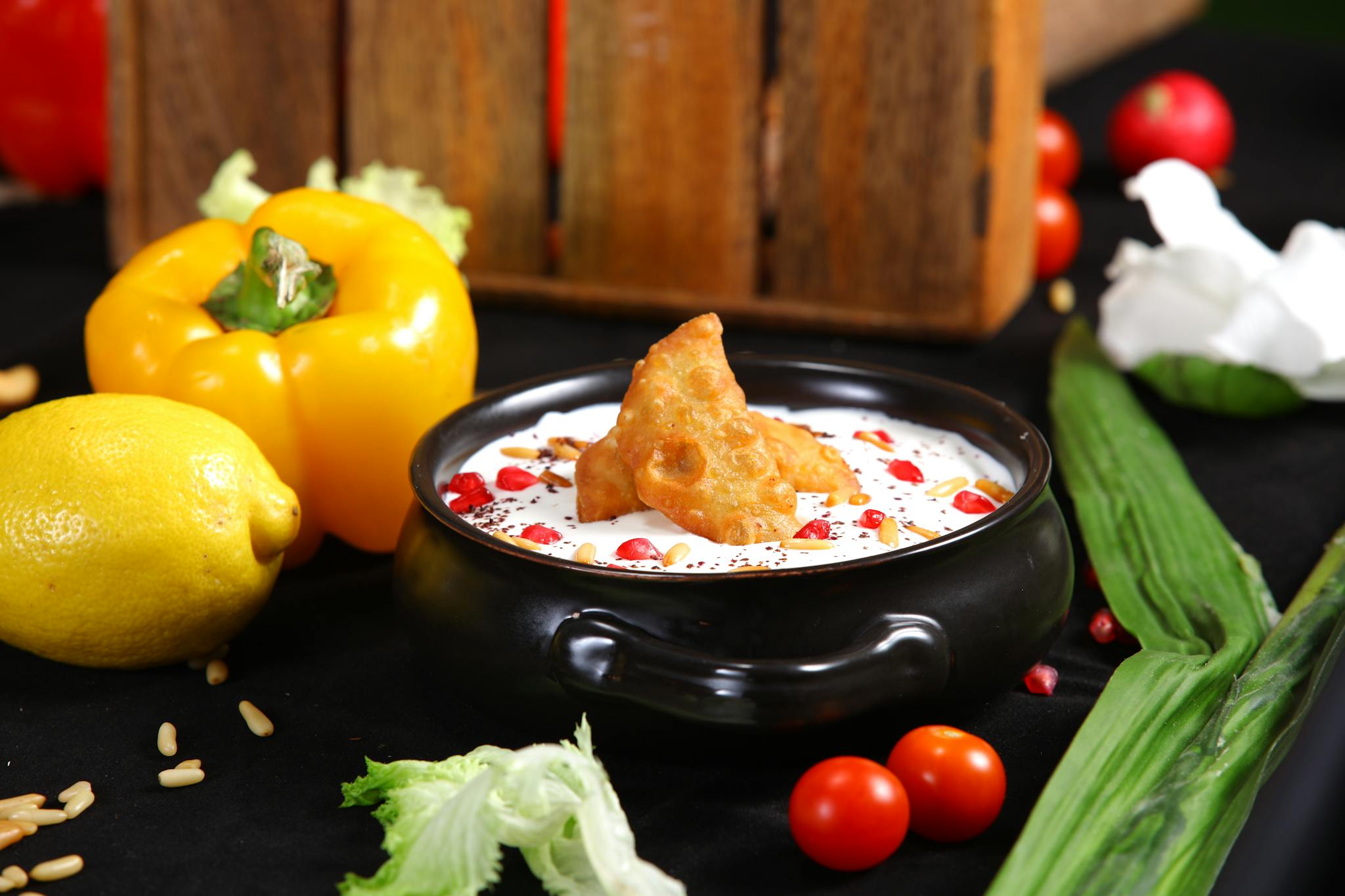 Home Delightful Middle Eastern Dish Garnished With Pomegranate Seeds Surrounded By Fresh Vegetables. 6262227 2048x1365