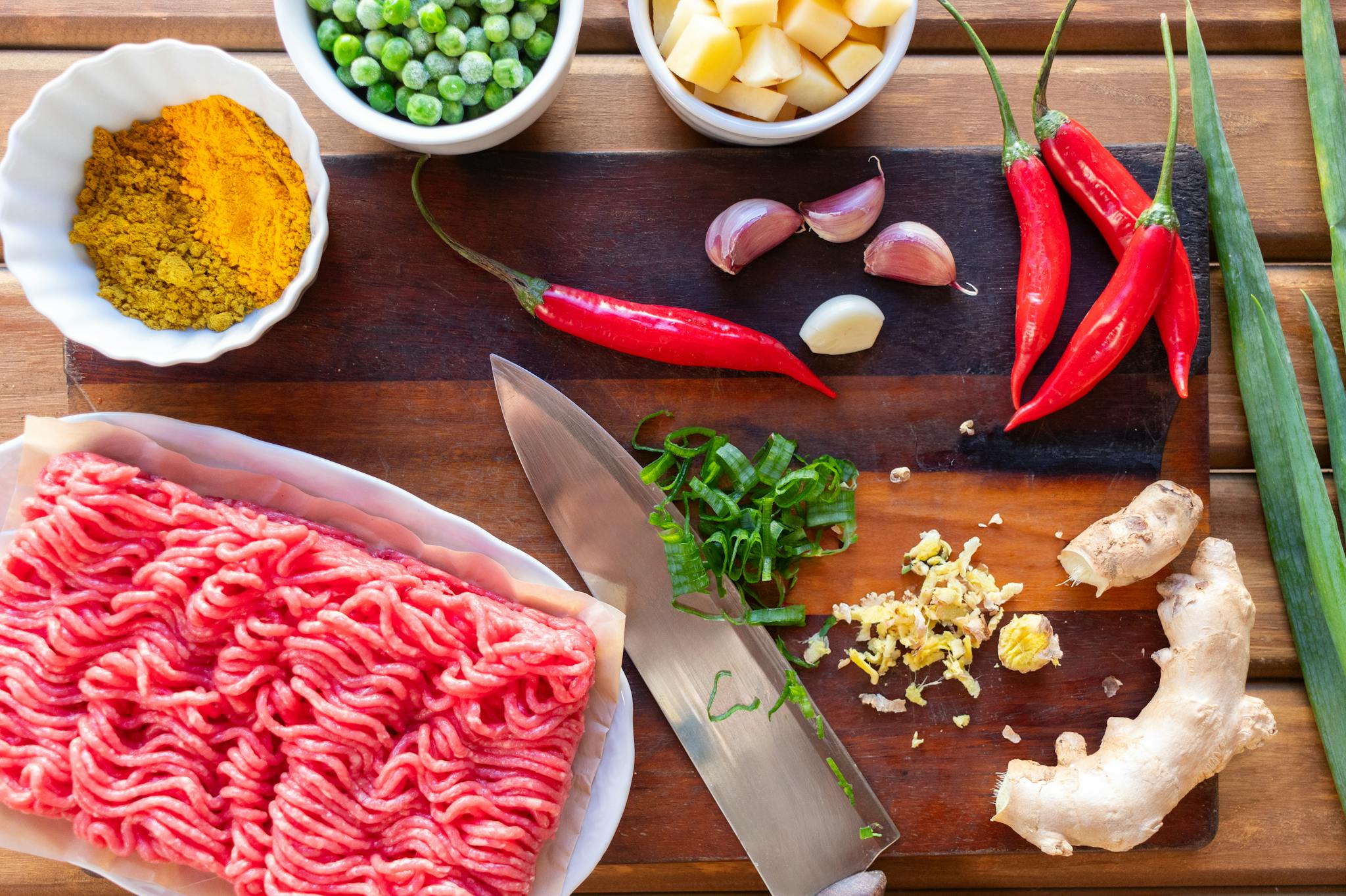 Home Fresh Ingredients Displayed On A Cutting Board Perfect For Preparing A Spicy Beef Stir Fry. 34429584 2048x1365